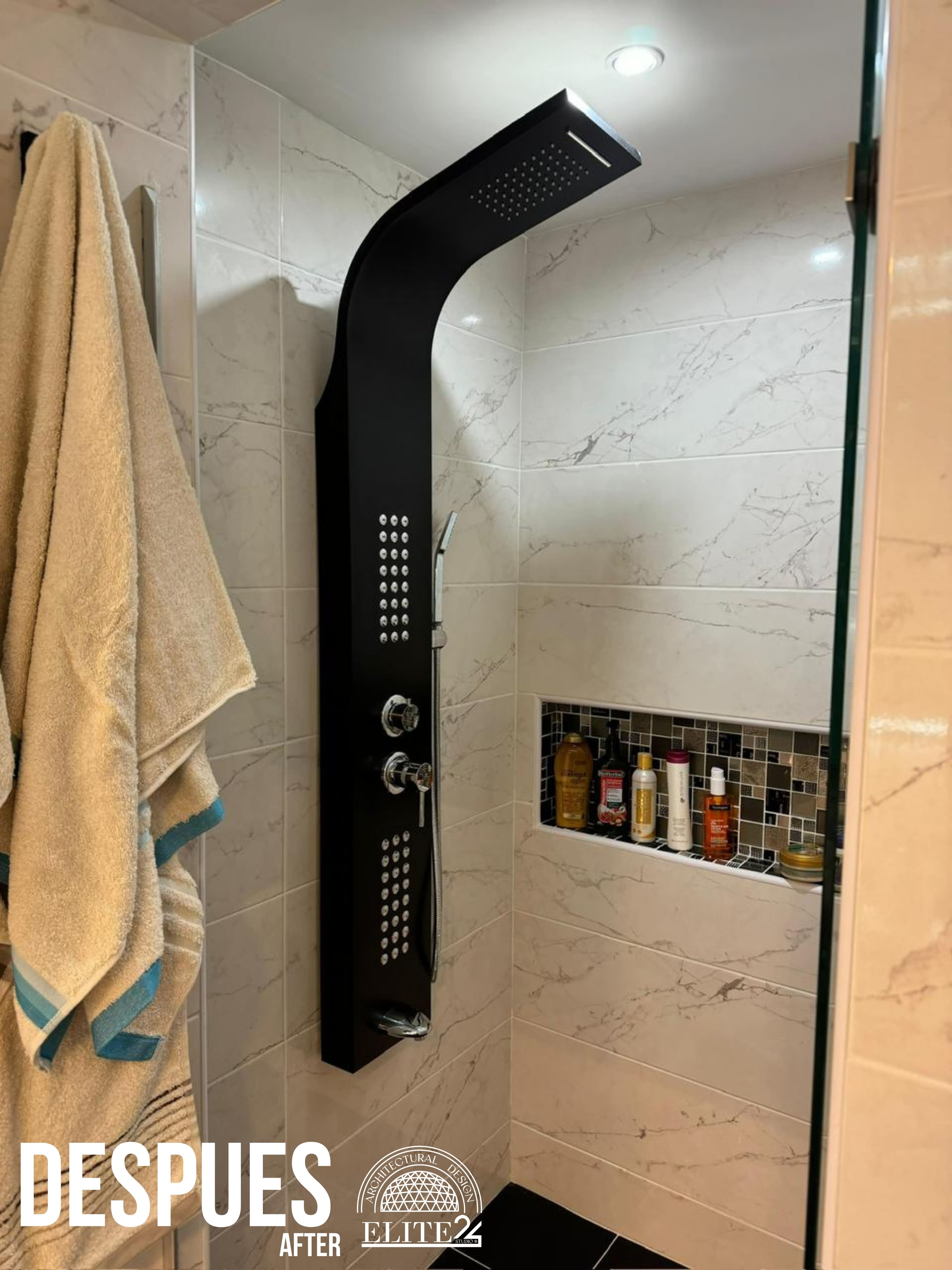 Suelo negro de gran formato que ancla el diseño del Baño 702 - Elite24 Studio, estudio de diseño interior en Bogotá